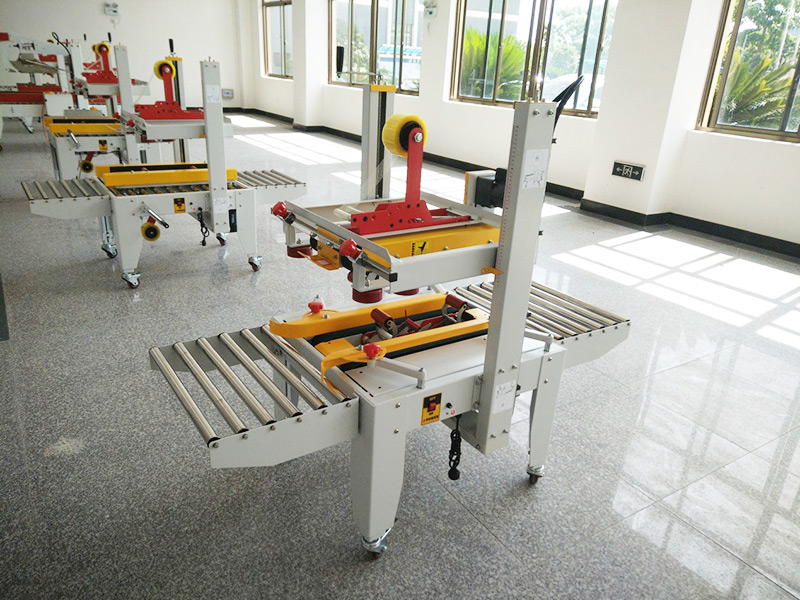 JS-FX500C 上下驅(qu)動手動(dong)折蓋膠(jiāo)帶封箱(xiāng)機